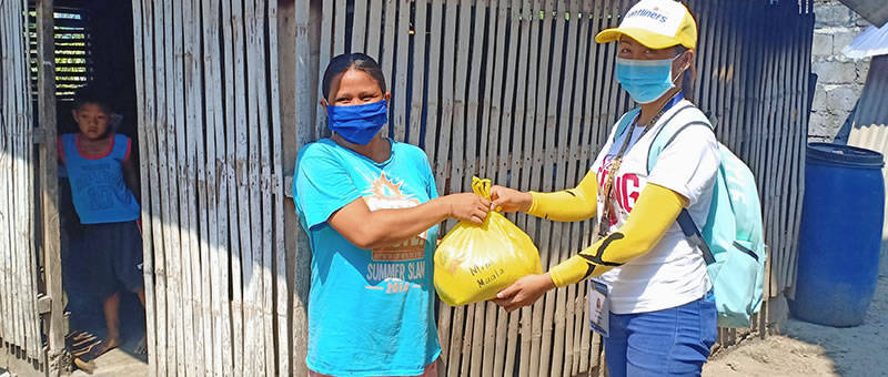 Distributing groceries gives hope and nutrition to the isolated and quarantined.