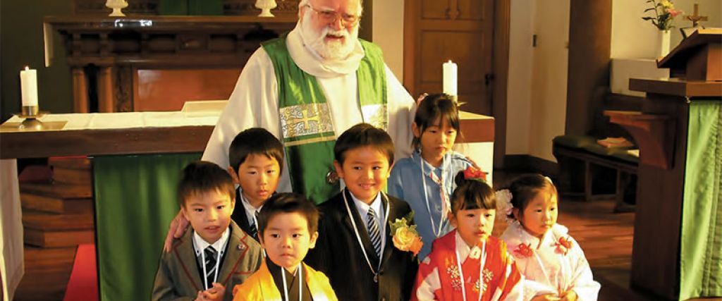 Fr. Barry and young parishioners