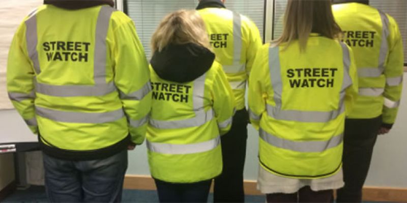 Streetwatch volunteers patrol areas in an effort to deter criminal activity.